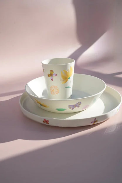 Selection of flower  sticker prints of plates cups and bowls.