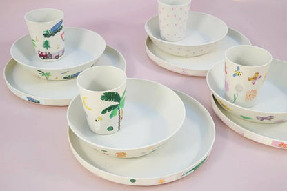 Selection of truck flower and palm tree sticker prints of plates cups and bowls.