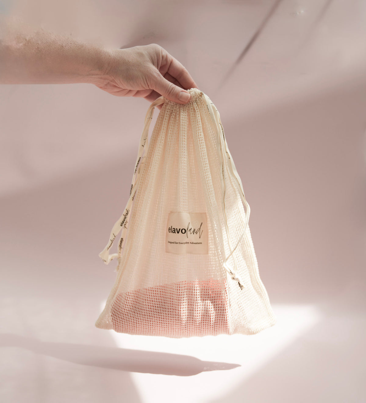 Mesh bag with cups.