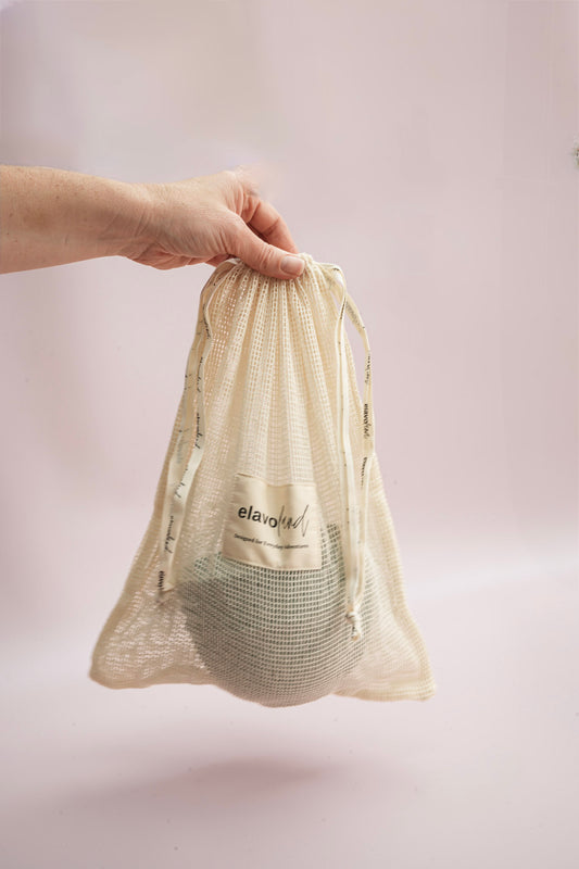 Stack of plates in a mesh bag.